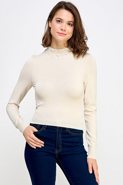 pearl embellished neck long sleeve knit top