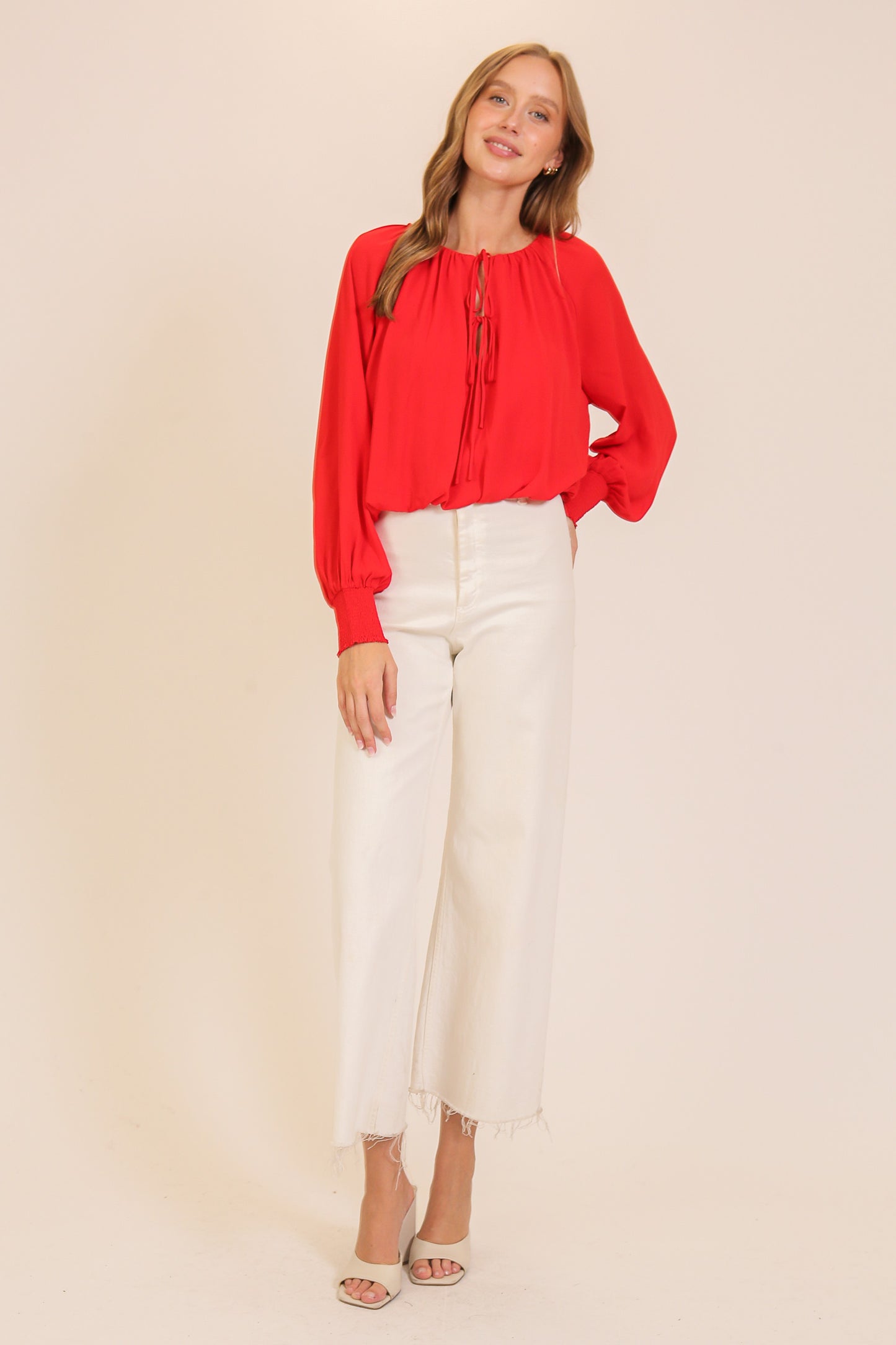 smocked cuff tie neck blouse