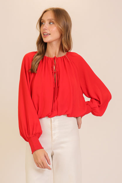 smocked cuff tie neck blouse
