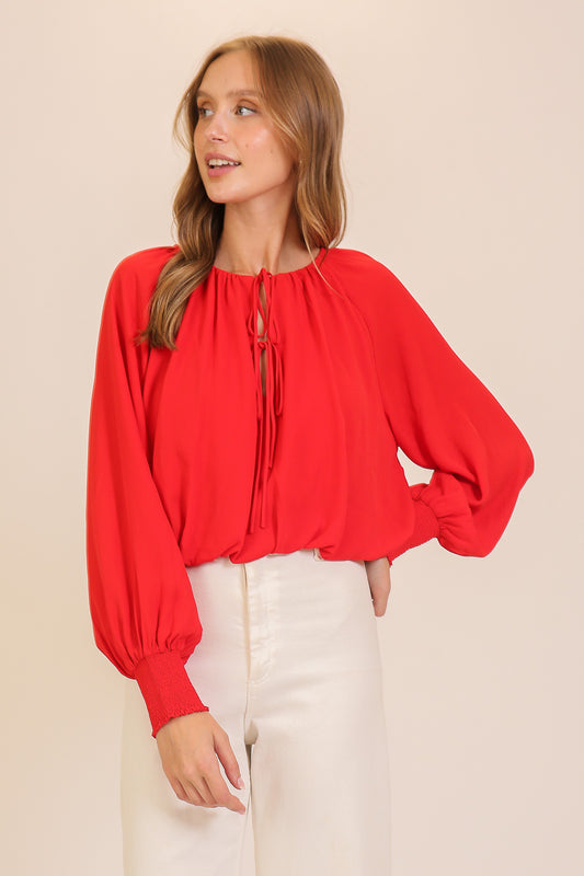smocked cuff tie neck blouse