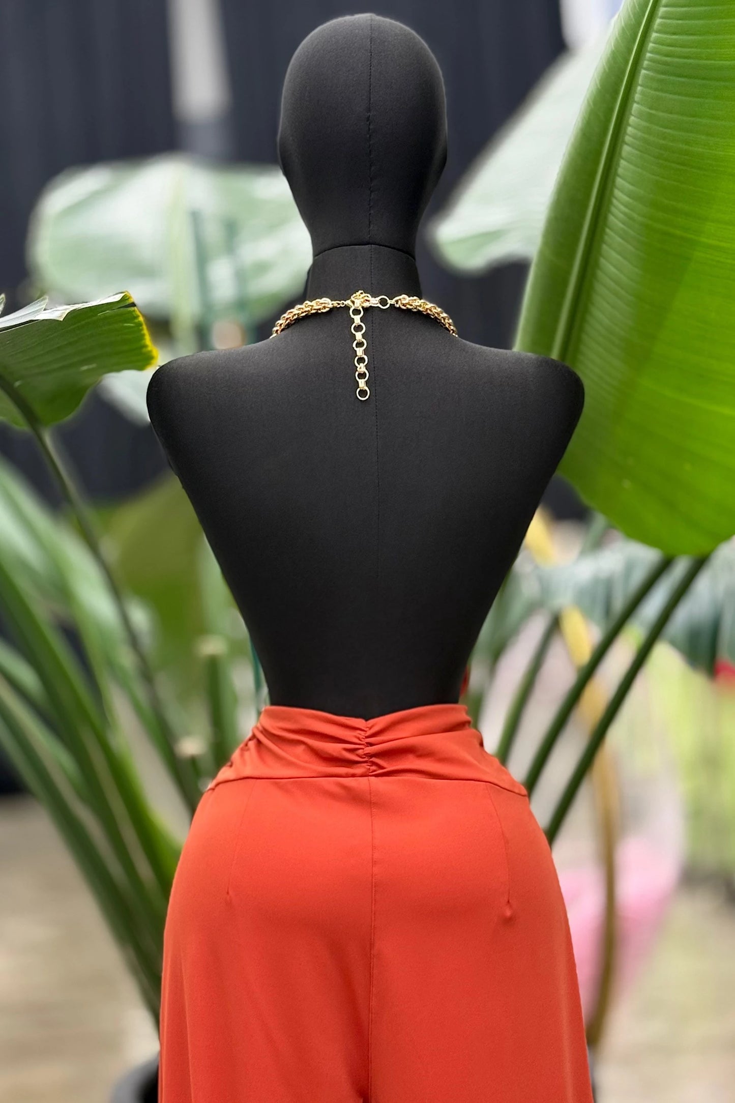 chain strap open back jumpsuit