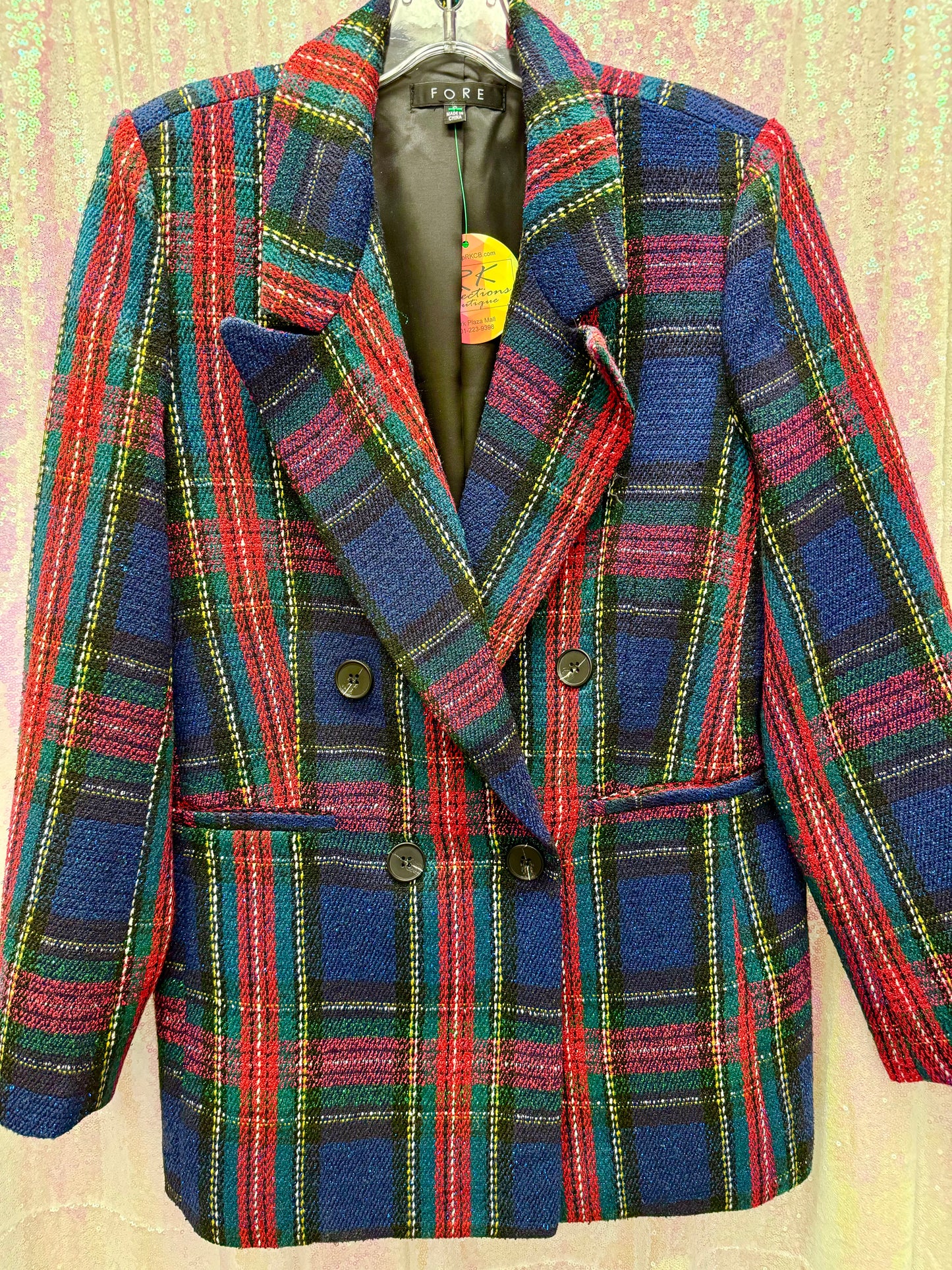 blazer de tweed con doble botonadura y tartán