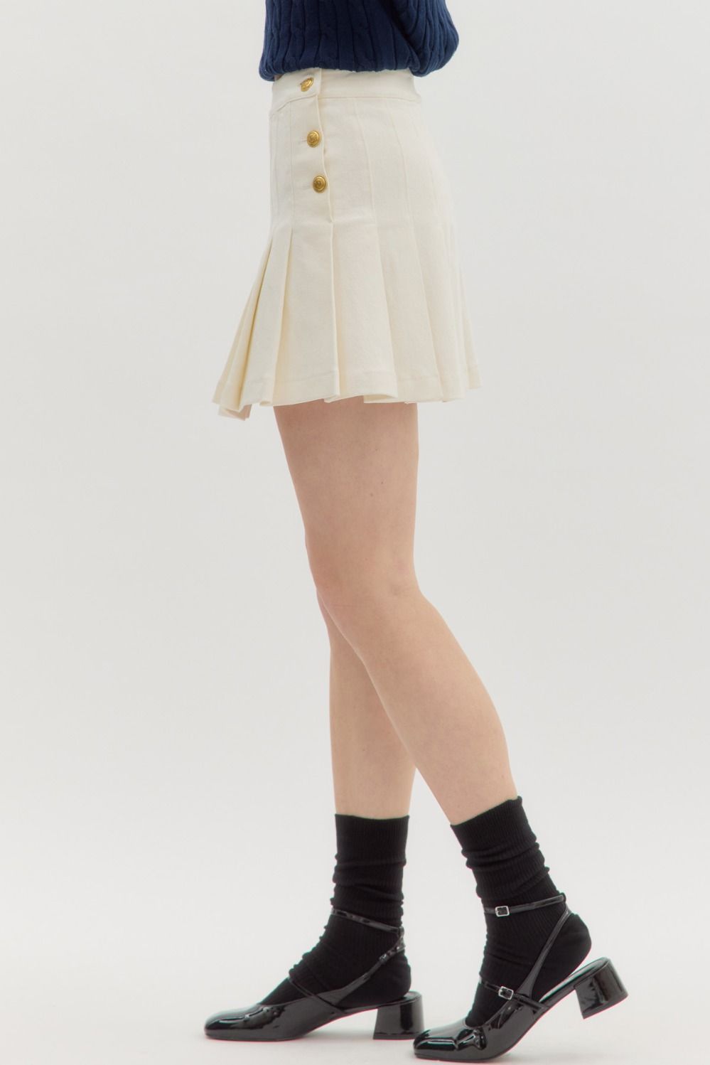 gold button pleated denim skirt