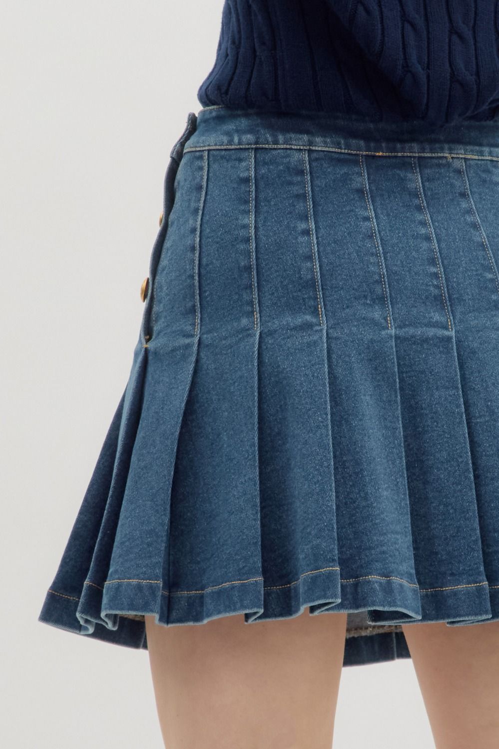 gold button pleated denim skirt