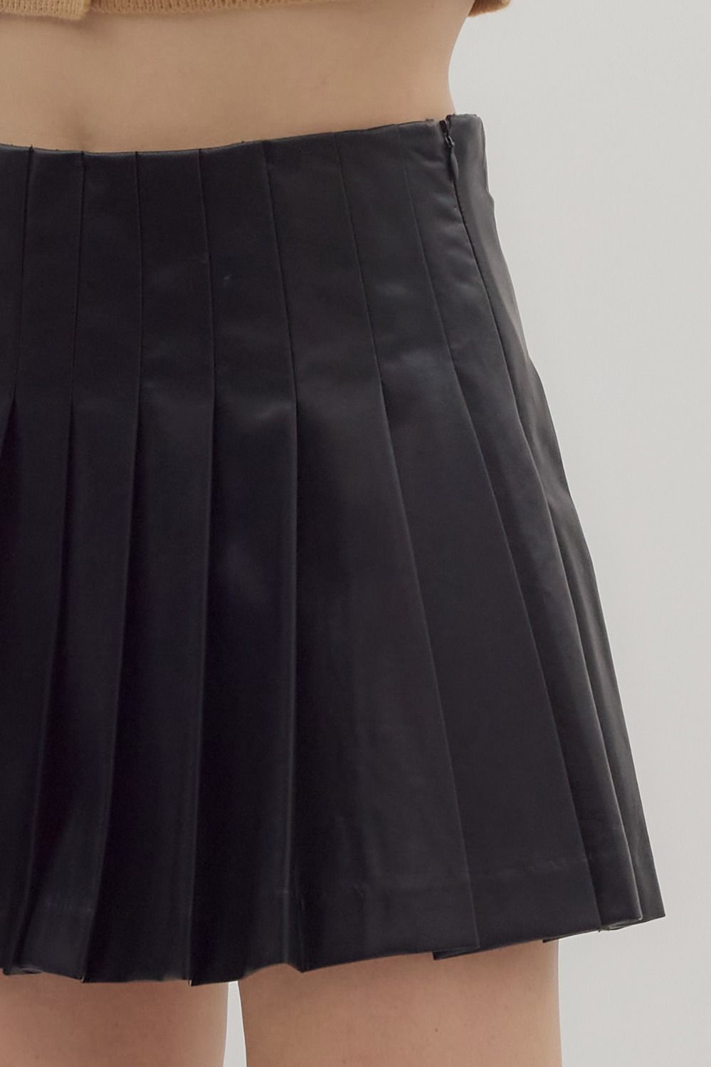 pleated faux leather mini skirt
