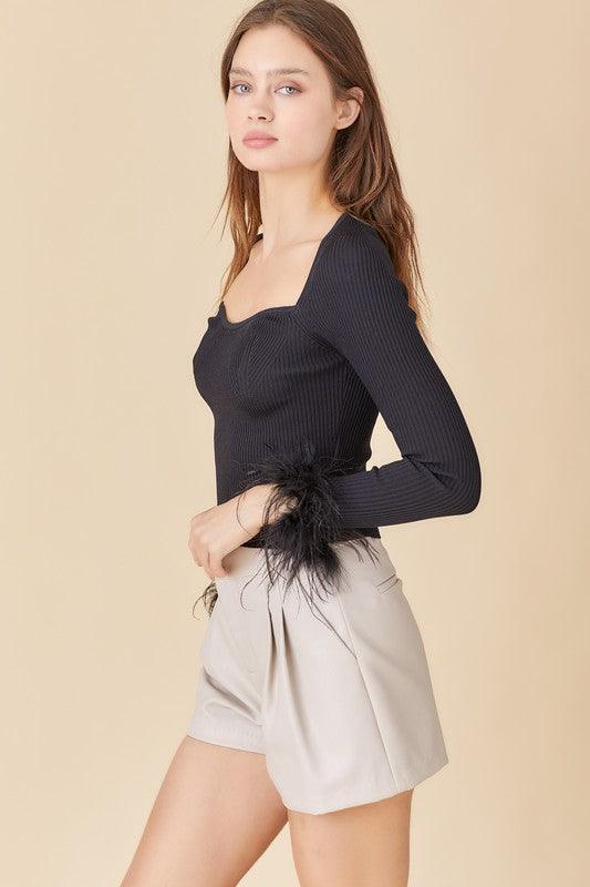 feather cuff ribbed long sleeve top