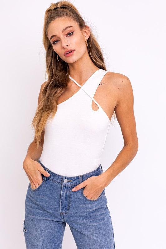 Cross shops over bodysuit